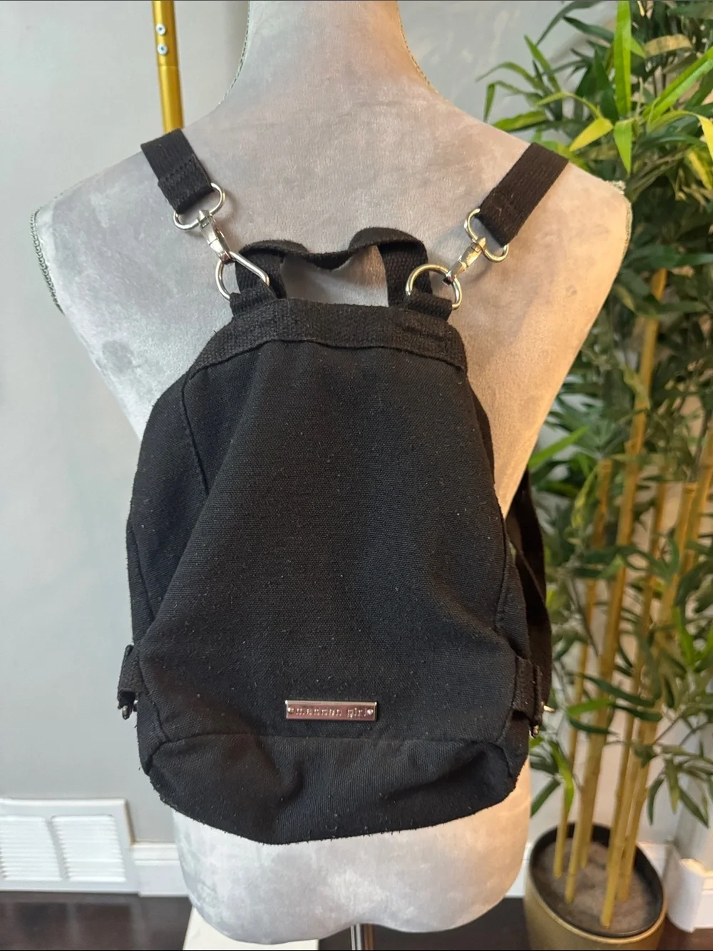 Madden Girl Black Canvas Drawstring Backpack with Front Zip Pocket